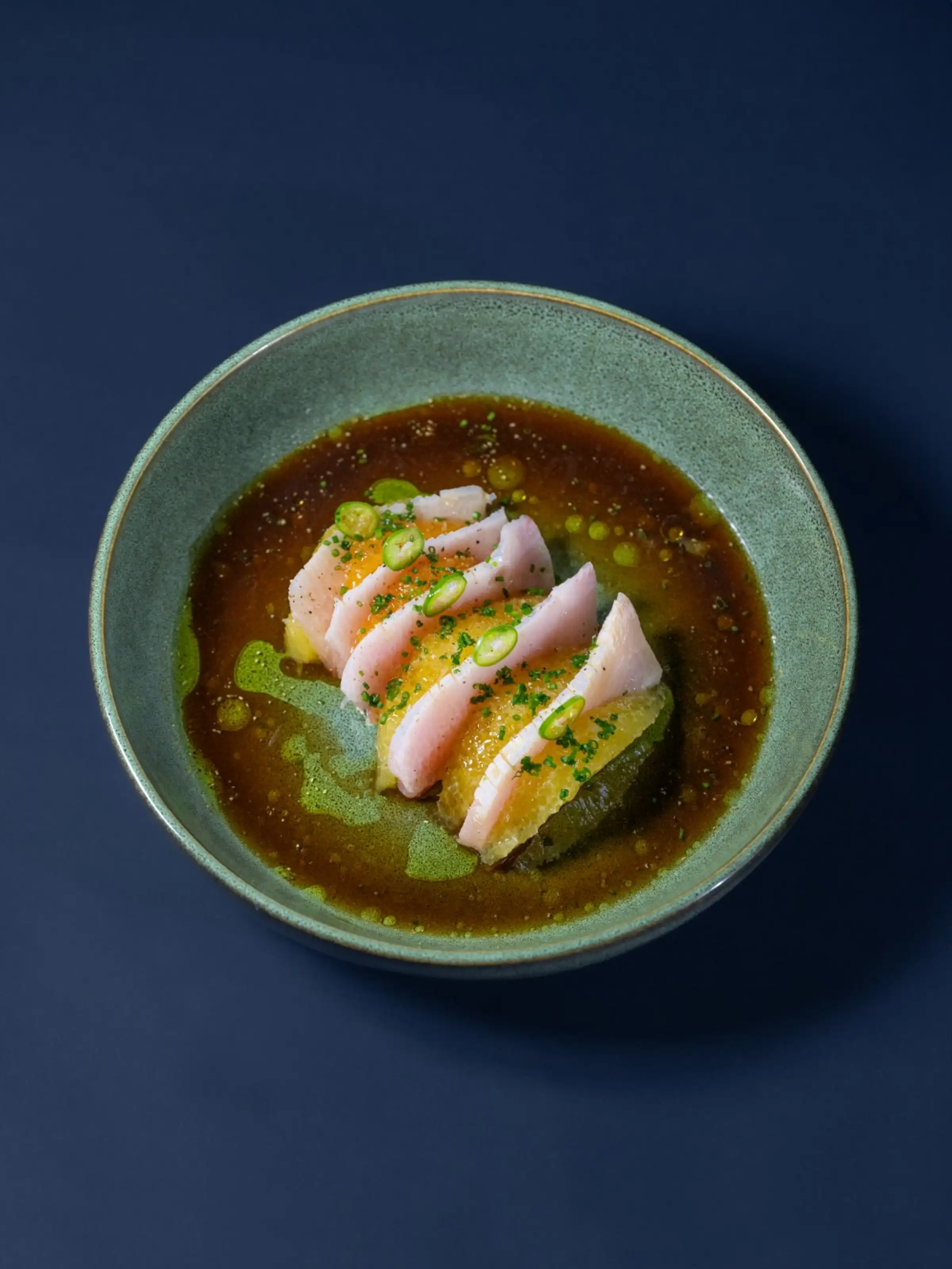 Hamachi crudo with orange confit, ponzu, and serrano pepper at Kitsu Nori